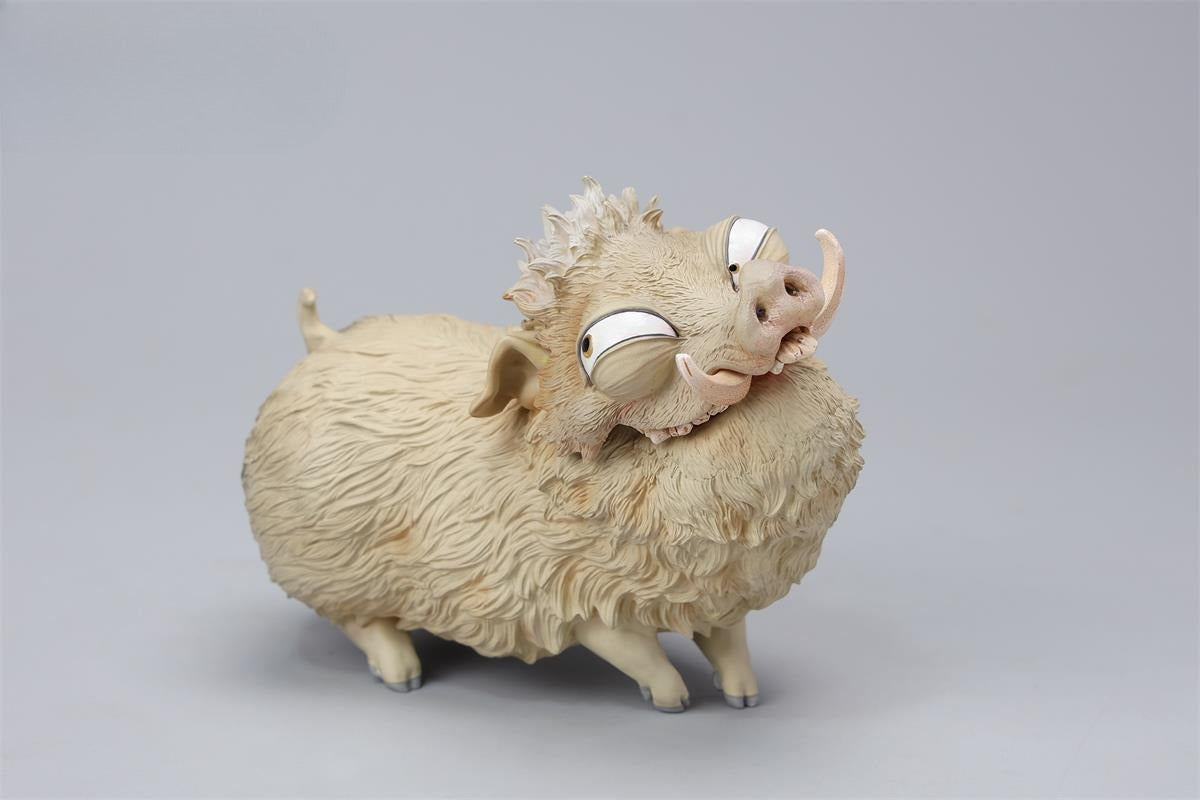 A detailed 1/12 scale Chinese Zodiac Pig figurine with a removable face made from high-quality resin. Features playful design with intricate textures and is perfect for collectors and animal lovers.