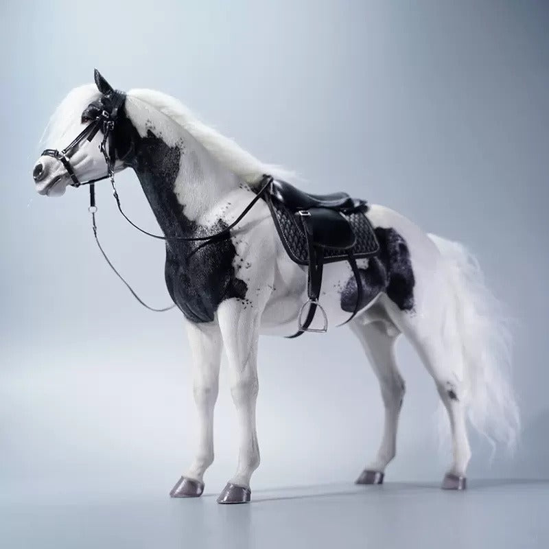 Realistic 1/6 scale American Paint Horse model with a detachable harness, crafted from resin, leather, and metal. This hand-painted horse features a white and brown coat and fine details, perfect for collectors and action figure enthusiasts.