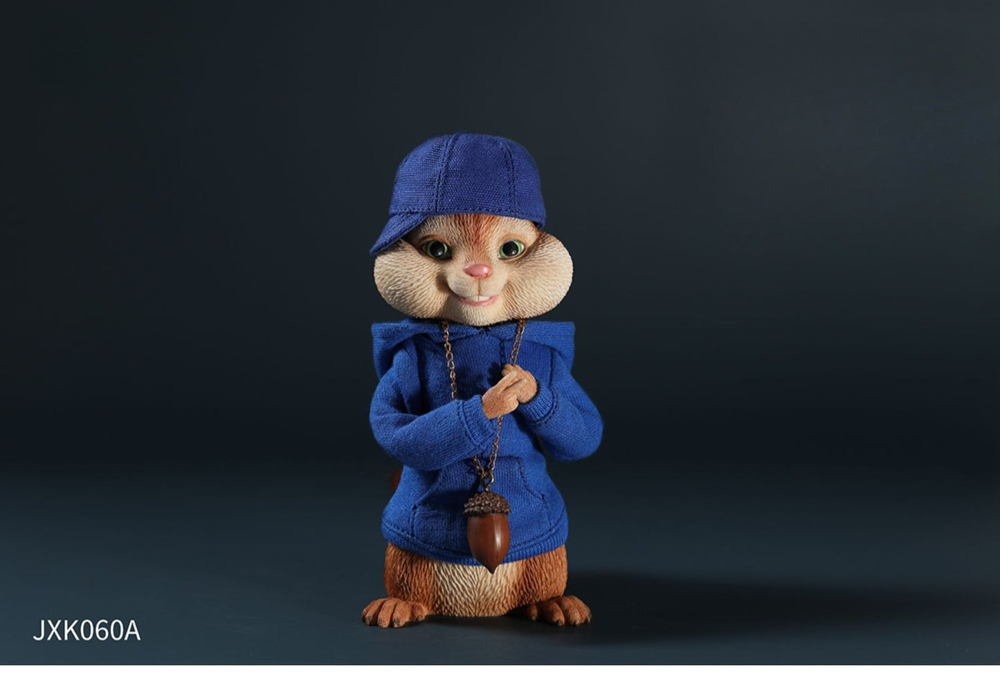 A detailed resin figurine of a chipmunk from Alvin and the Chipmunks, wearing a red hoodie and cap with an acorn necklace. Perfect for collectors and fans of the animated movie series.