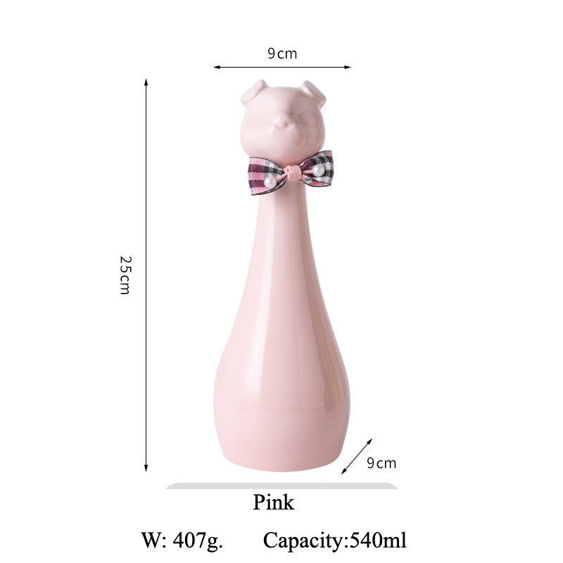 Yellow ceramic cat-shaped pet cremation urn with a glossy finish, featuring a stylish cat figure with a bow tie on a slender base, ideal for North American pet owners. This handcrafted urn provides secure ashes storage, perfect for home memorial display on mantels or shelves, with a vibrant yellow hue and elegant design.