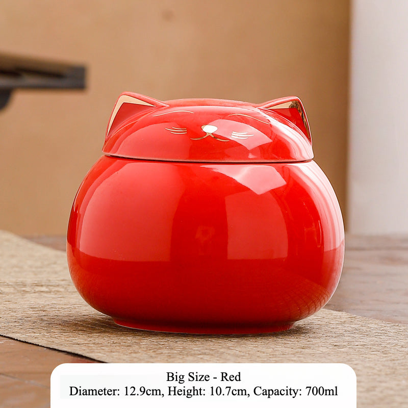 This is a cute cat-shaped pet urn with a photo frame for memorializing your pet. It securely holds your pet's ashes and includes a photo space to cherish your pet's memory. The urn has a smooth, high-quality finish with a stable base for display. Available in various sizes.