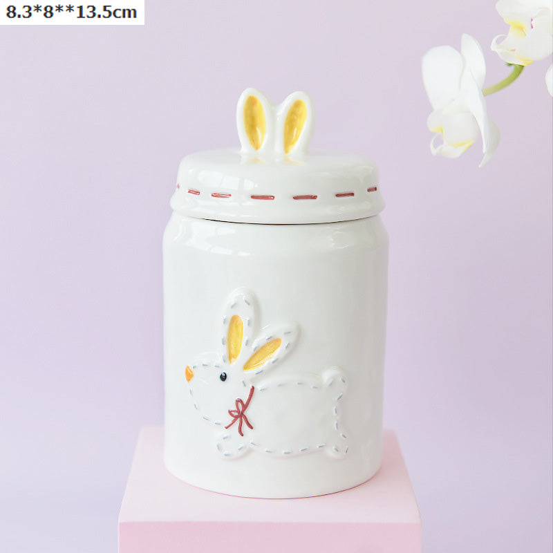 Cute rabbit-shaped pet urn, moisture-proof and ideal for cats and dogs. It features a secure lid and space for photos or mementos, offering a comforting and playful way to honor your pet's memory.