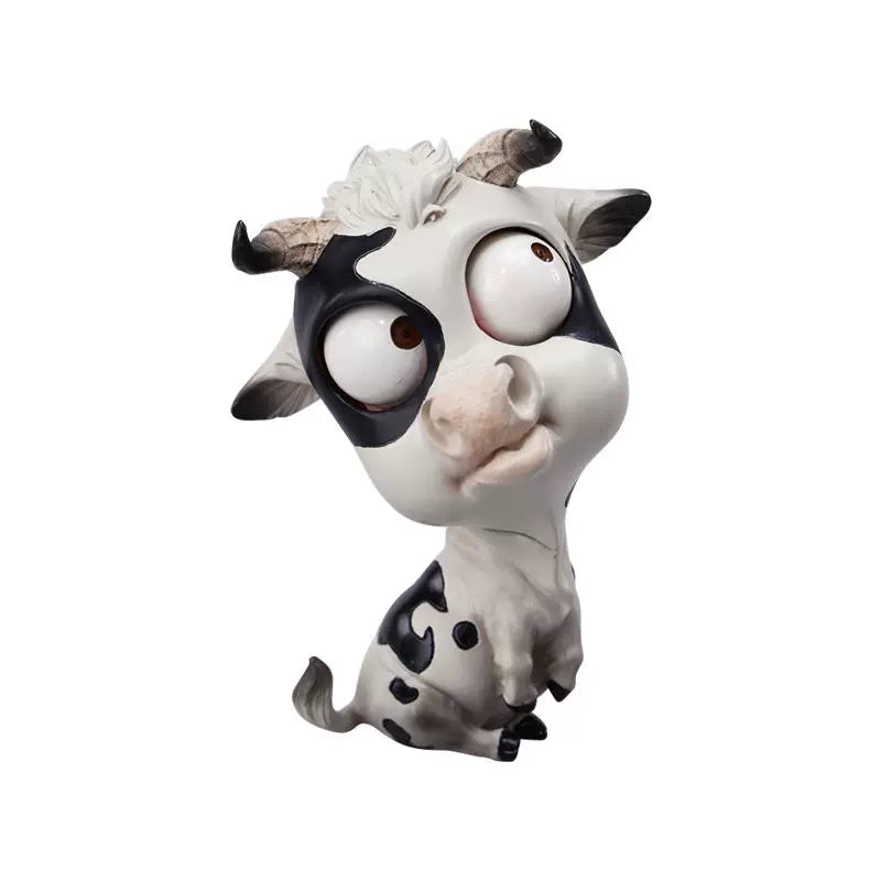 A detailed hand-painted ox figurine from the 12 Chinese Zodiac collection featuring a quirky removable face, premium resin material, and intricate artistic details. A perfect collector’s item and home decor piece for zodiac enthusiasts.
