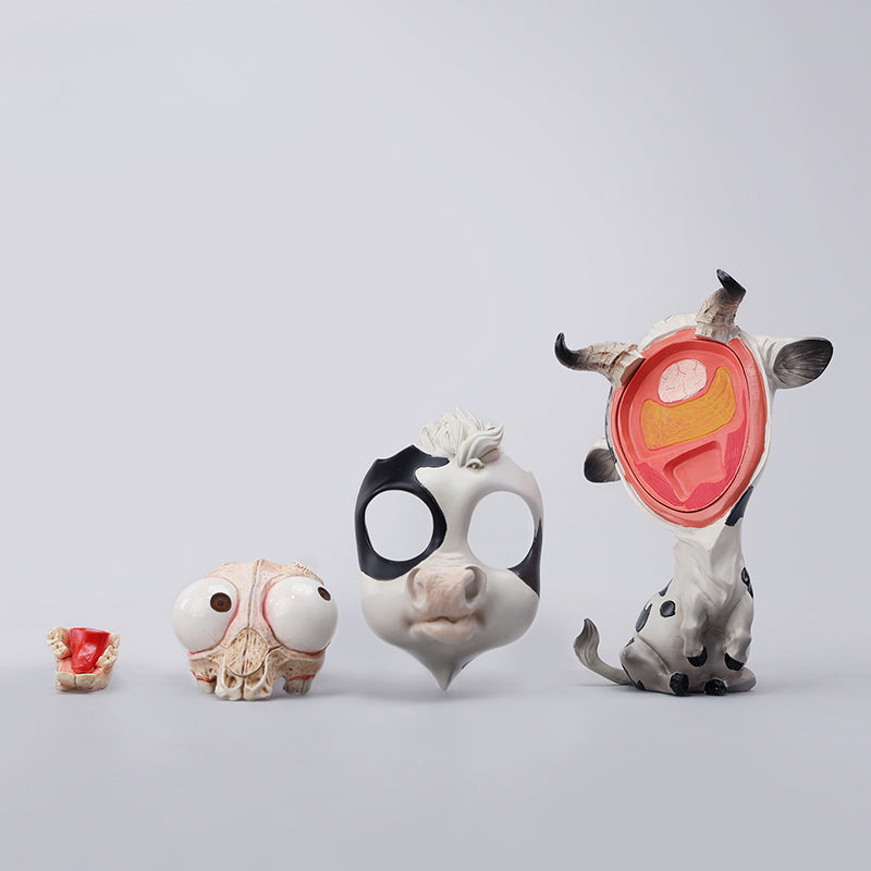 A detailed hand-painted ox figurine from the 12 Chinese Zodiac collection featuring a quirky removable face, premium resin material, and intricate artistic details. A perfect collector’s item and home decor piece for zodiac enthusiasts.