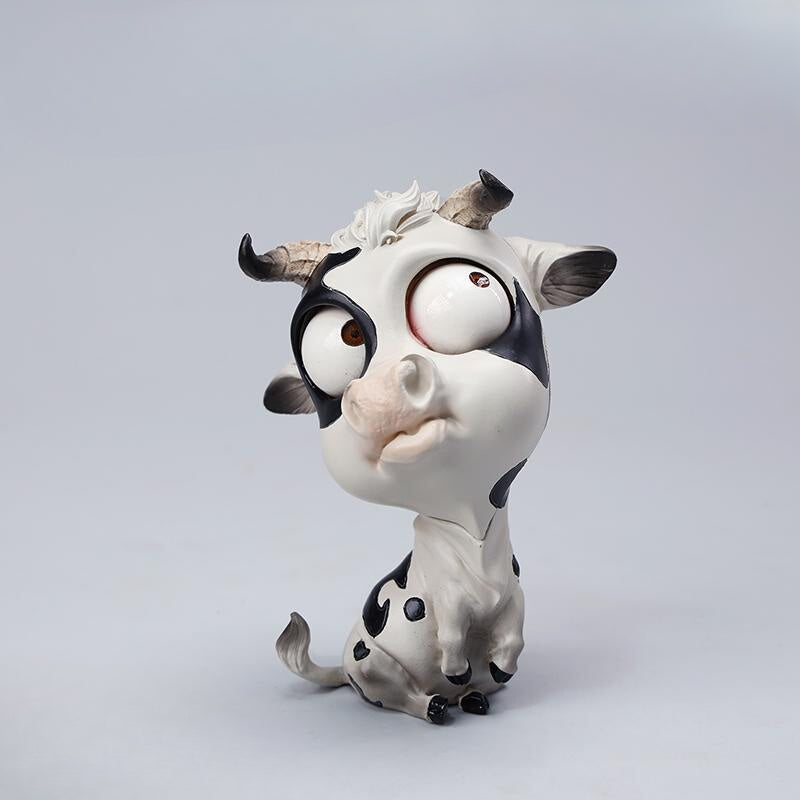 A detailed hand-painted ox figurine from the 12 Chinese Zodiac collection featuring a quirky removable face, premium resin material, and intricate artistic details. A perfect collector’s item and home decor piece for zodiac enthusiasts.
