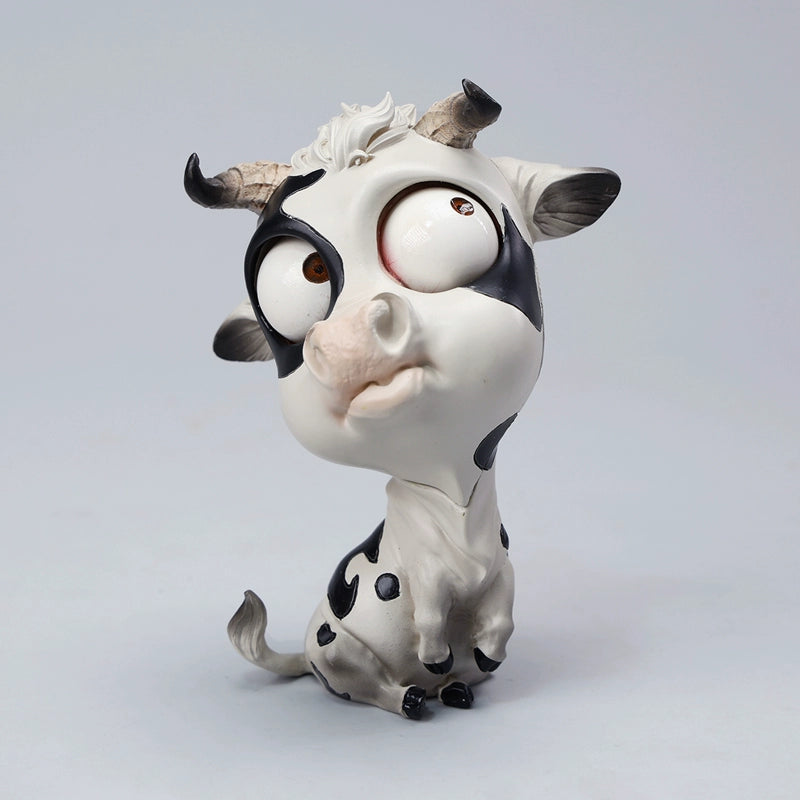 A detailed hand-painted ox figurine from the 12 Chinese Zodiac collection featuring a quirky removable face, premium resin material, and intricate artistic details. A perfect collector’s item and home decor piece for zodiac enthusiasts.