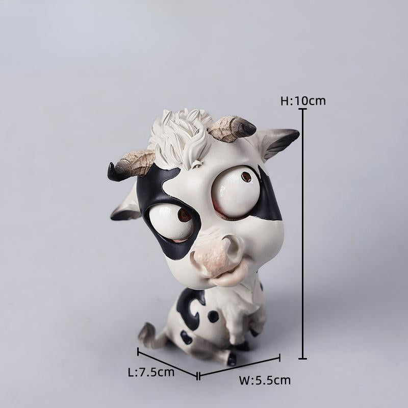 A detailed hand-painted ox figurine from the 12 Chinese Zodiac collection featuring a quirky removable face, premium resin material, and intricate artistic details. A perfect collector’s item and home decor piece for zodiac enthusiasts.