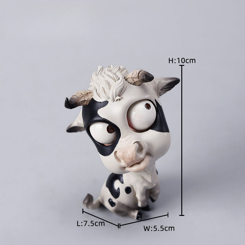 A detailed hand-painted ox figurine from the 12 Chinese Zodiac collection featuring a quirky removable face, premium resin material, and intricate artistic details. A perfect collector’s item and home decor piece for zodiac enthusiasts.
