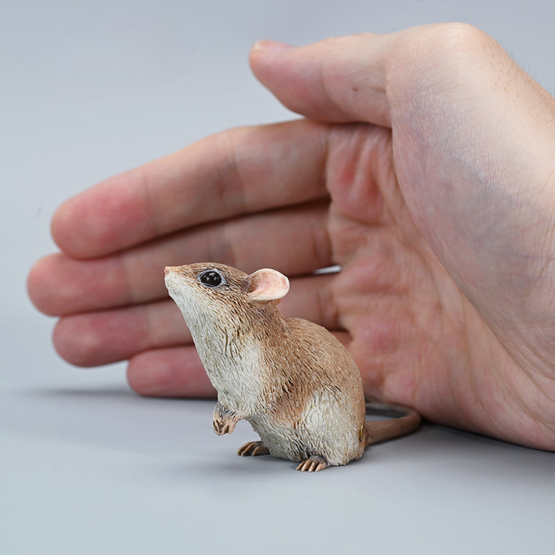 This image showcases a highly detailed, lifelike mouse figurine, part of the Pre-sale 1/1 Small Simulation Mouse Model collection. The model features a realistic depiction with intricate fur texture, expressive eyes, and delicate paws, highlighting its craftsmanship. The mouse is posed naturally, making it a perfect addition to any animal lover's collection.