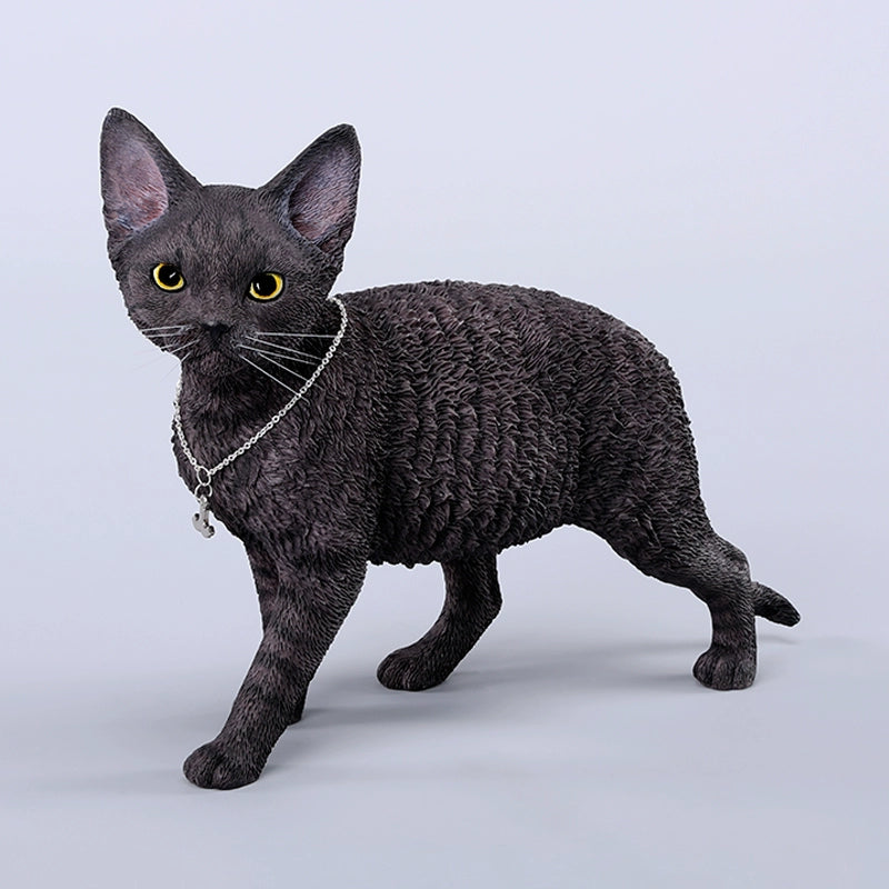 A detailed 1/3 scale model of a German Curly Cat in white, showcasing its unique curly fur texture. The cat is adorned with a silver necklace and has strikingly realistic features, making it a perfect collectible for cat lovers and enthusiasts. The model captures the playful and inquisitive nature of the breed with lifelike details.