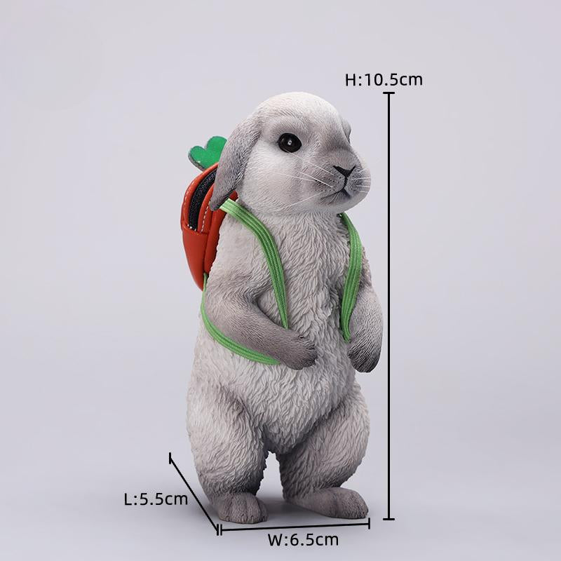 Adorable 1/4 scale American Lop Rabbit figurine with a removable carrot backpack, hand-painted with high detail. Perfect for animal lovers and collectors, showcasing the rabbit’s playful nature and lifelike texture. Ideal for display on shelves or as a gift.