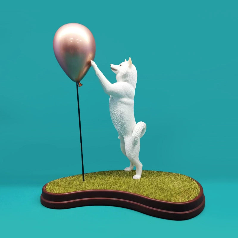  Image Details Image Renamed: 1_6_Acting_Cute_Shiba_Inu_2.0_Model.jpg Product Title 1/6 Scale Acting Cute Shiba Inu 2.0 Model – Adorable Shiba Inu Figurine with Golden Balloon  Product Description Introducing the 1/6 scale Acting Cute Shiba Inu 2.0 model, a charming figurine that perfectly captures the playful nature of the Shiba Inu breed. This delightful model features a Shiba Inu standing on its hind legs, reaching up towards a shiny golden balloon. The figurine is set on a beautifully crafted base that 