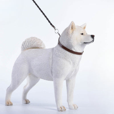 Three 1/6 scale models of Akita dogs, each with a different coat color: dark grey, white, and orange. The models feature realistic fur textures and detailed expressions, capturing the noble and strong nature of the Akita breed.