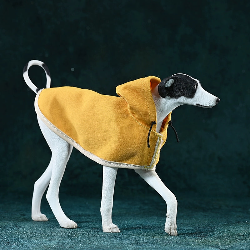 A 1/6 scale model of an Azawakh dog wearing a yellow cape, showcasing a stylish and protective outfit. The dog has a brown coat and a sleek, slender physique.