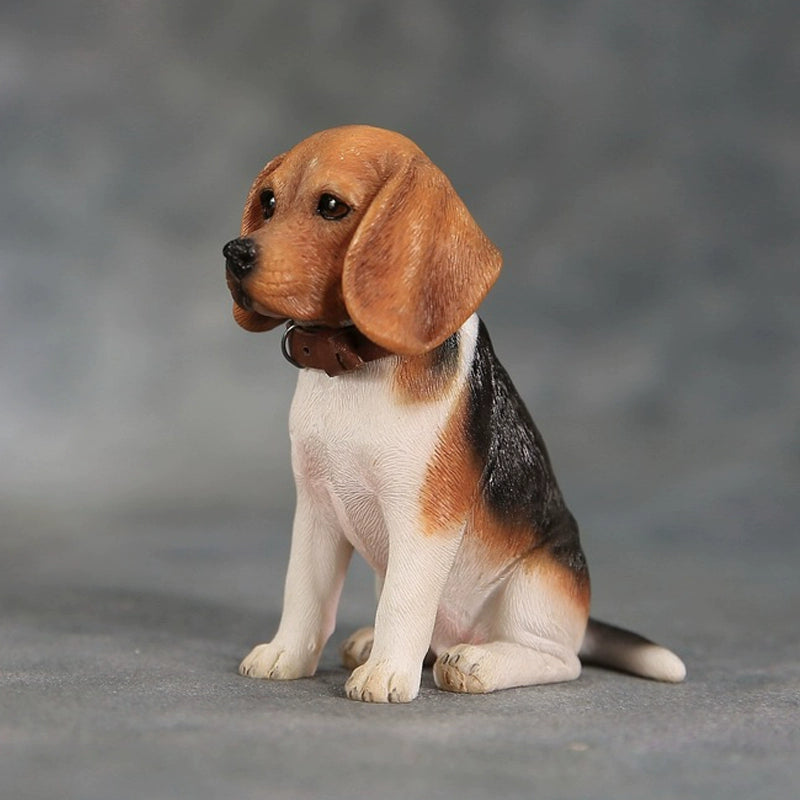 Two 1/6 scale models of Beagle puppies, named Miguel, with expressive faces and large, droopy ears. The puppies have brown and white fur, one with a darker coat and the other with a lighter shade. Both are wearing brown collars.