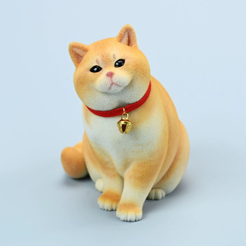 A set of four 1/6 scale British Short-haired Cat models in various fur colors, sitting on a wooden bench. Each cat wears a red collar with a small golden bell, capturing their lifelike and charming expressions. Perfect for collectors and cat enthusiasts.