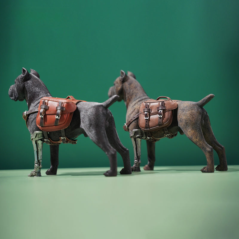 Two 1/6 scale models of dogs equipped with brown leather saddlebags and mechanical prosthetic legs. The models feature detailed and realistic designs, showcasing a mix of rugged and futuristic elements.