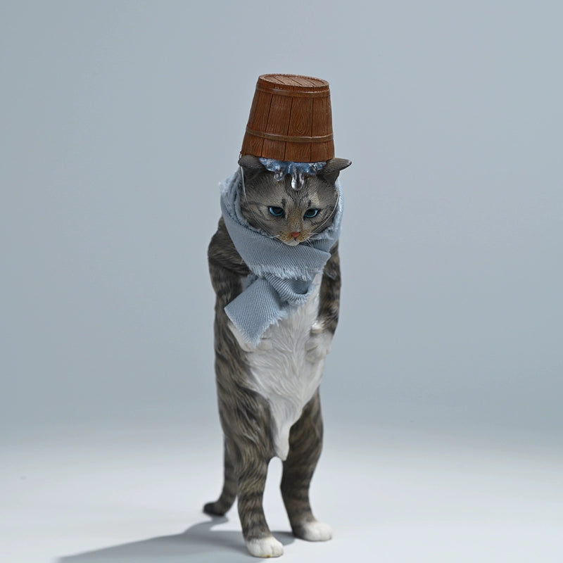 A set of four 1/6 scale cat figurines, each standing on two legs, wearing a grey scarf and a wooden bucket hat with water dripping off. The cats come in different colors: calico, black, orange tabby, and grey. They are depicted in a humorous and unique pose reminiscent of traditional bathhouse attire. The image is set against a simple background.