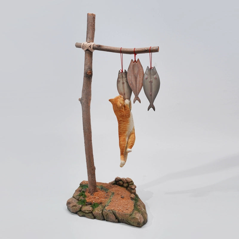 "A whimsical 1/6 scale model featuring five cats of different colors—orange, grey, white, black, and tabby—hanging from a tree branch, reaching towards fish tied above them. The cats are depicted in a playful and humorous manner, capturing a moment of mischief."