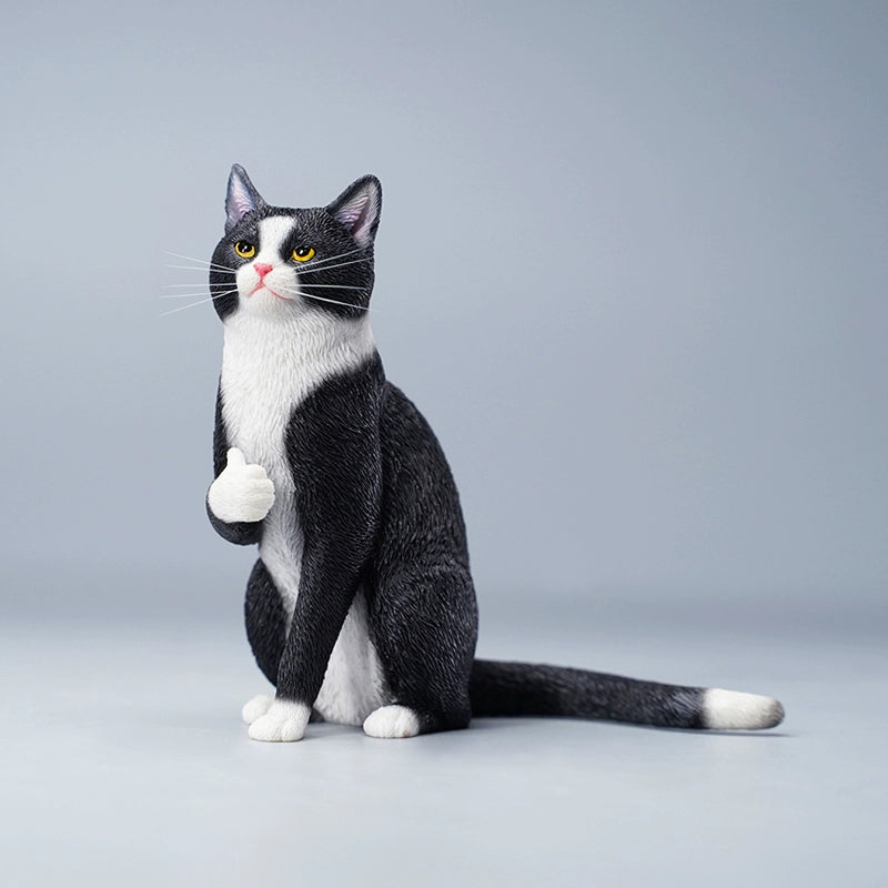 "Two realistic 1/6 scale sculptures of Chinese Domestic cats, one orange tabby and one grey tabby, each with their paw raised in a thumbs-up gesture. The figurines are intricately detailed with lifelike fur textures and expressive faces, capturing the playful and unique pose perfectly."
