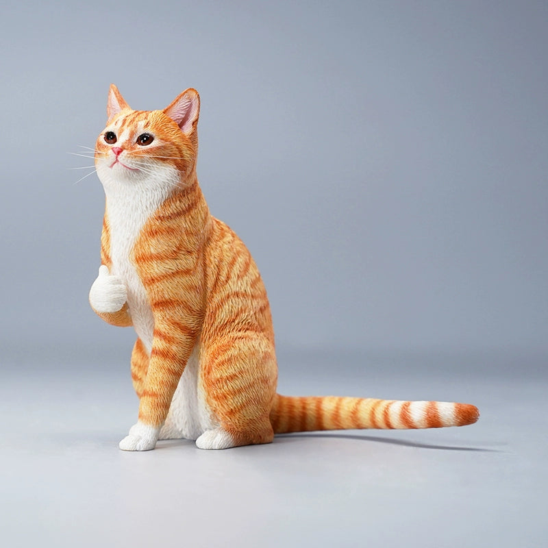 "Two realistic 1/6 scale sculptures of Chinese Domestic cats, one orange tabby and one grey tabby, each with their paw raised in a thumbs-up gesture. The figurines are intricately detailed with lifelike fur textures and expressive faces, capturing the playful and unique pose perfectly."