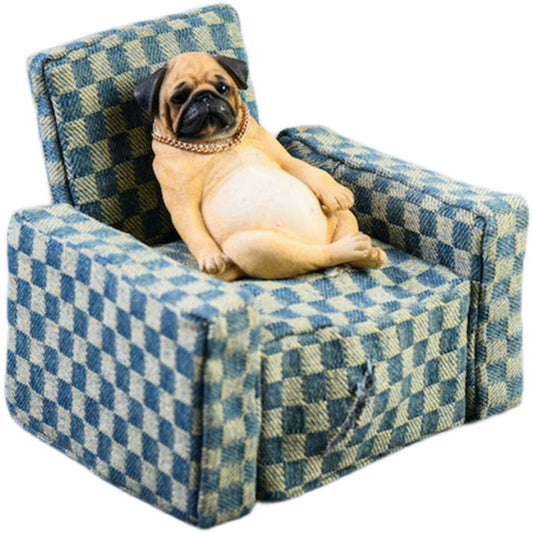 "A set of four 1/6 scale Pug dog models in different poses, sitting on a patterned blue armchair, showcasing a relaxed and decadent style."