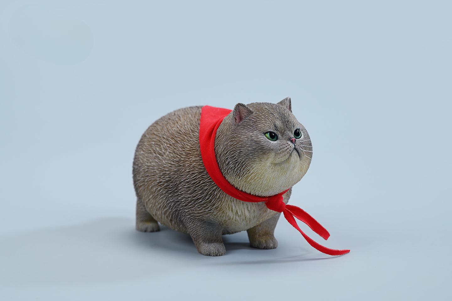  A collection of 1/6 Fat Cat 5.0 Models featuring four charming cat figurines in different colors, each adorned with a red scarf. The figurines showcase detailed expressions and fur textures, perfect for cat lovers and collectors.