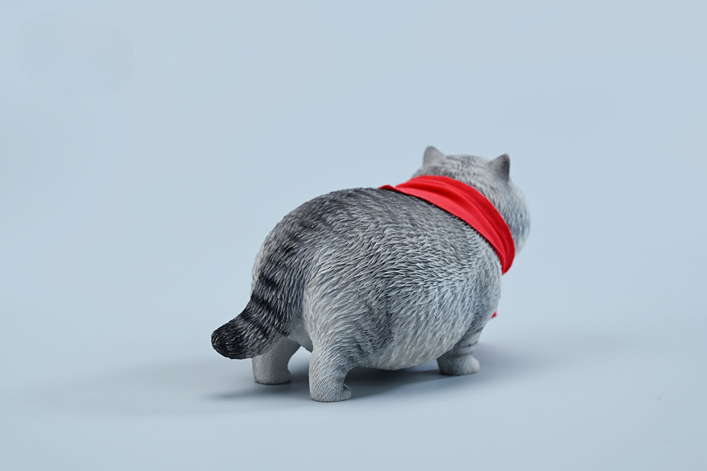  A collection of 1/6 Fat Cat 5.0 Models featuring four charming cat figurines in different colors, each adorned with a red scarf. The figurines showcase detailed expressions and fur textures, perfect for cat lovers and collectors.