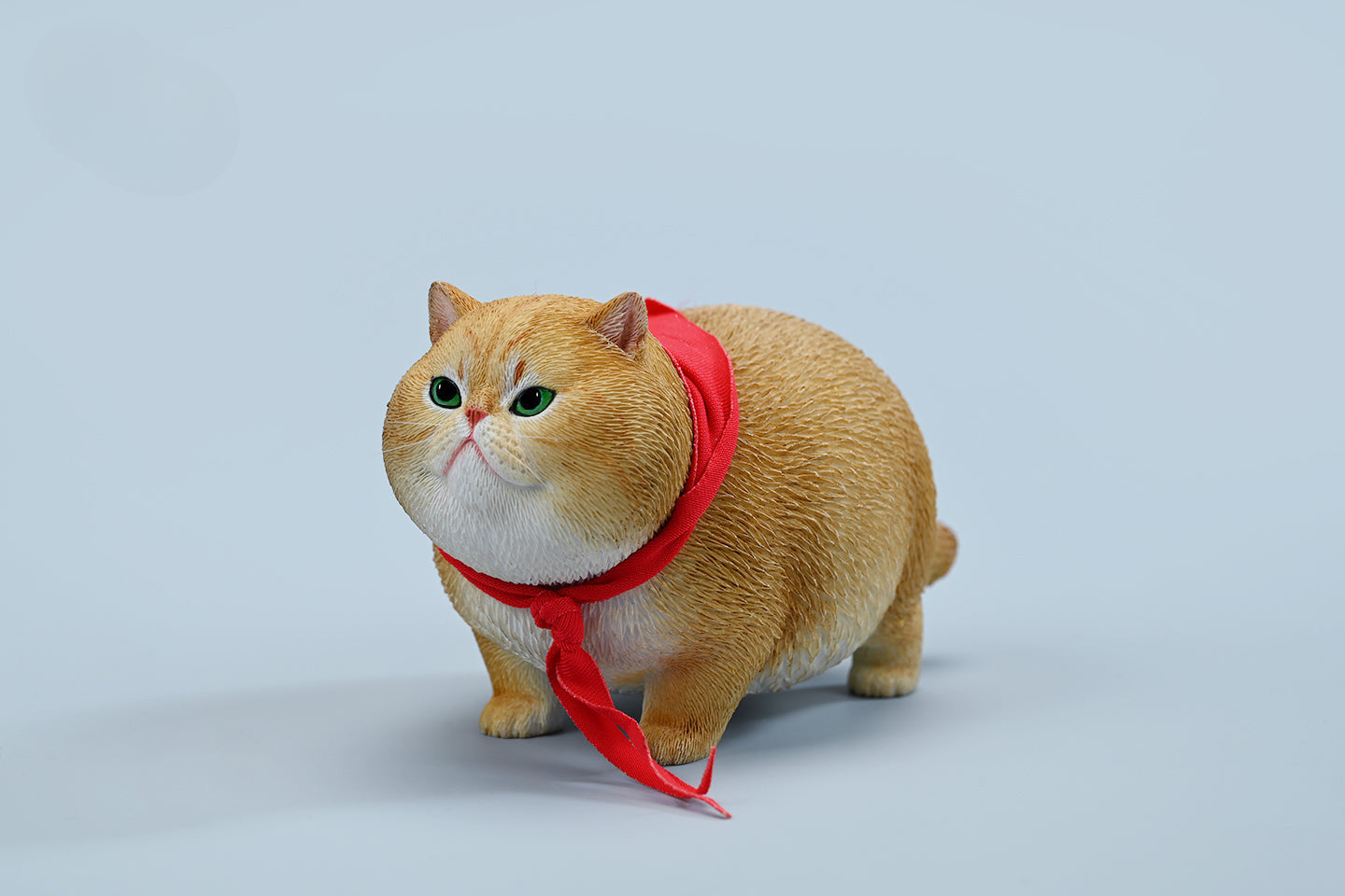  A collection of 1/6 Fat Cat 5.0 Models featuring four charming cat figurines in different colors, each adorned with a red scarf. The figurines showcase detailed expressions and fur textures, perfect for cat lovers and collectors.