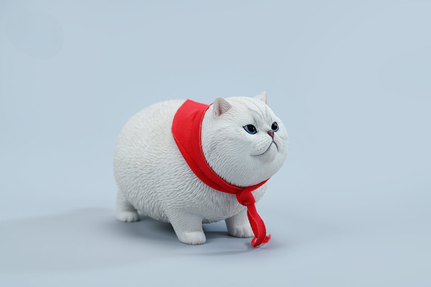  A collection of 1/6 Fat Cat 5.0 Models featuring four charming cat figurines in different colors, each adorned with a red scarf. The figurines showcase detailed expressions and fur textures, perfect for cat lovers and collectors.