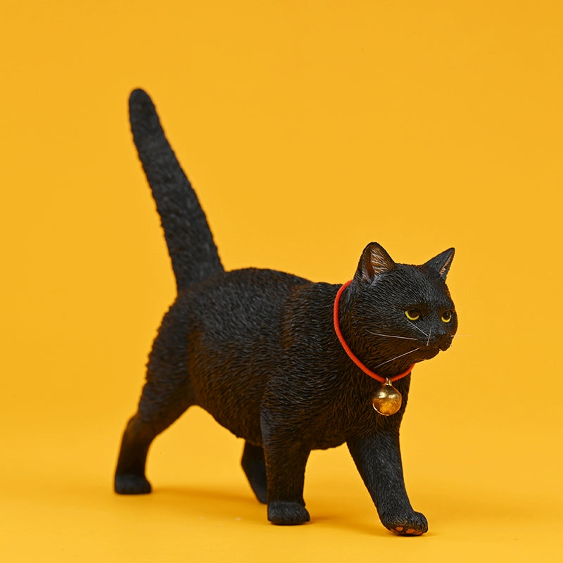Four 1/6 scale Felis Catus 4.0 Model figurines, featuring detailed representations of different cat breeds with distinct coat colors, each wearing a red collar with a gold bell. The cats are positioned in a walking stance against a bright yellow background, showcasing their unique personalities and lifelike textures.