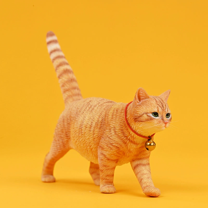 Four 1/6 scale Felis Catus 4.0 Model figurines, featuring detailed representations of different cat breeds with distinct coat colors, each wearing a red collar with a gold bell. The cats are positioned in a walking stance against a bright yellow background, showcasing their unique personalities and lifelike textures.