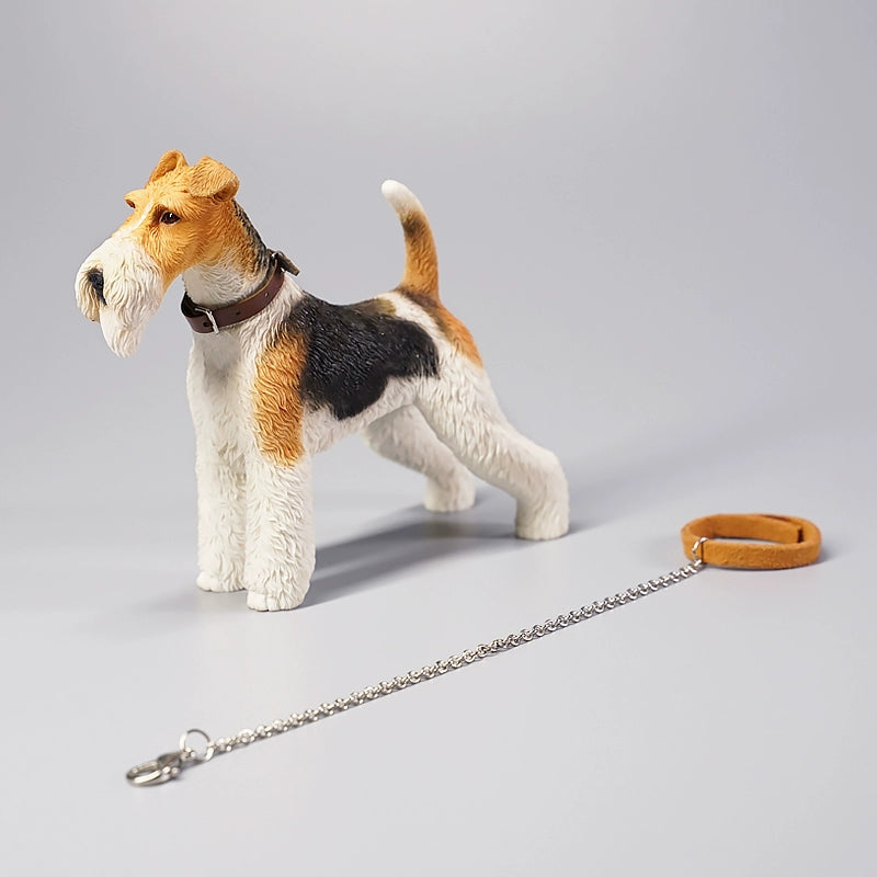 A collection of 1/6 scale Fox Terrier models featuring realistic and detailed representations of the Fox Terrier breed. These figurines showcase the distinct features of Fox Terriers, including their expressive eyes, pointed ears, and characteristic wiry coat. Available in various color patterns, these models are ideal for collectors and dog lovers.