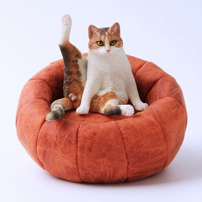 "Five detailed resin models of lazy cats are shown sitting with their legs raised, each in different poses and colors. The cats display unique and expressive features, capturing the essence of relaxation in feline form. The background is neutral, emphasizing the intricate design and texture of each figurine, making them a perfect addition to any cat lover's collection."