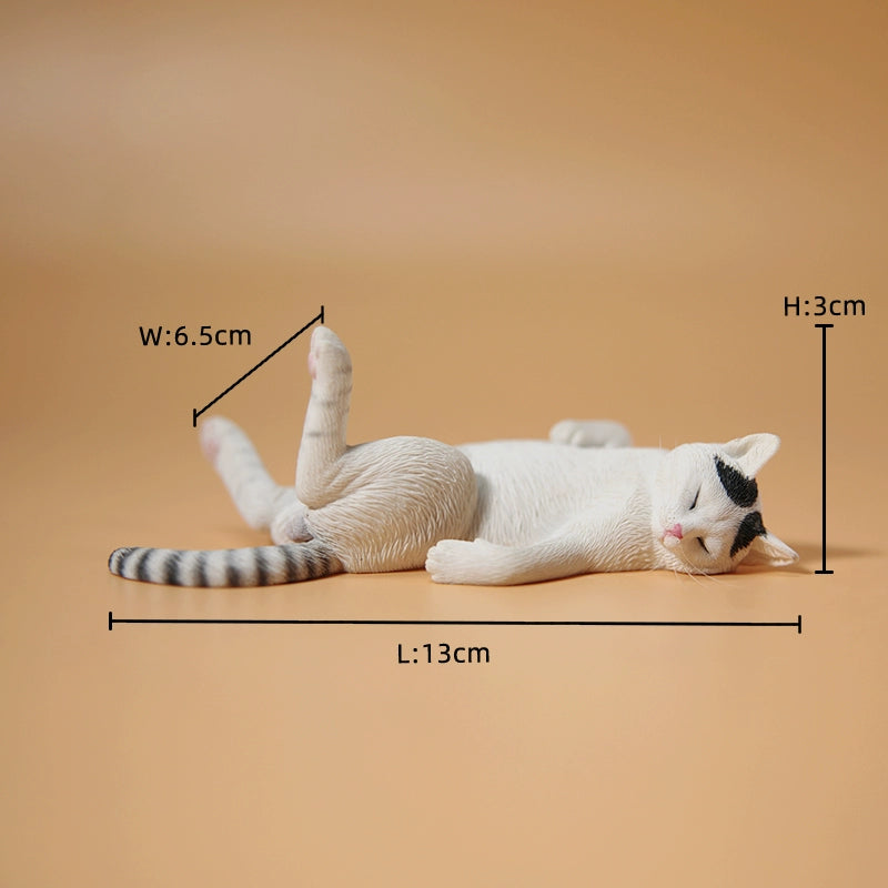 A set of 1/6 scale Lethargic Cat 5.0 models showing various cats in different relaxed, sleeping positions. Each cat is detailed with realistic fur textures and unique coat colors, resting on a grey cushion or a dark grey couch, perfectly capturing the essence of a lazy cat's nap.