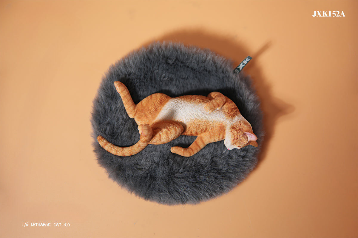 A set of 1/6 scale Lethargic Cat 5.0 models showing various cats in different relaxed, sleeping positions. Each cat is detailed with realistic fur textures and unique coat colors, resting on a grey cushion or a dark grey couch, perfectly capturing the essence of a lazy cat's nap.