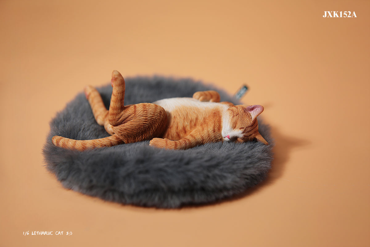 A set of 1/6 scale Lethargic Cat 5.0 models showing various cats in different relaxed, sleeping positions. Each cat is detailed with realistic fur textures and unique coat colors, resting on a grey cushion or a dark grey couch, perfectly capturing the essence of a lazy cat's nap.