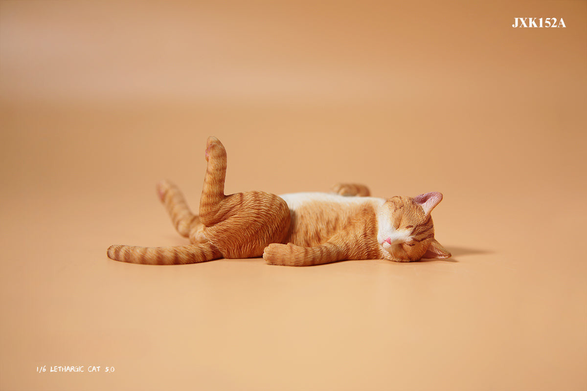 A set of 1/6 scale Lethargic Cat 5.0 models showing various cats in different relaxed, sleeping positions. Each cat is detailed with realistic fur textures and unique coat colors, resting on a grey cushion or a dark grey couch, perfectly capturing the essence of a lazy cat's nap.