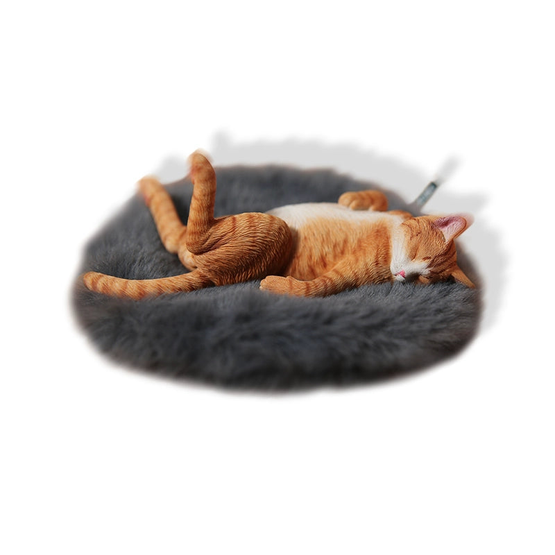 A set of 1/6 scale Lethargic Cat 5.0 models showing various cats in different relaxed, sleeping positions. Each cat is detailed with realistic fur textures and unique coat colors, resting on a grey cushion or a dark grey couch, perfectly capturing the essence of a lazy cat's nap.