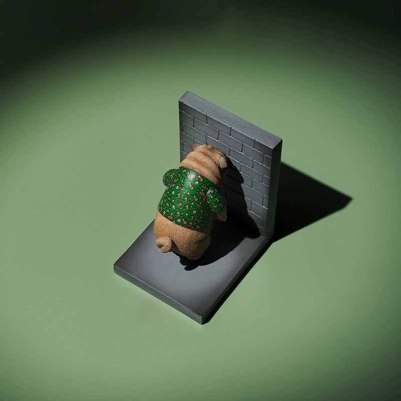  Image Rename: Northeast_Pug_Dog_Model.png  Alt Text: A collection of four 1/6 scale Northeast Pug Dog models, each pug wearing a festive red or green sweater with a floral pattern. The pugs are posed standing on their hind legs against a green background. One pug model is shown separately, leaning against a brick wall.