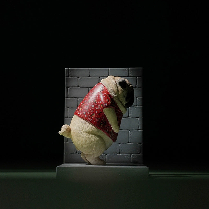  Image Rename: Northeast_Pug_Dog_Model.png  Alt Text: A collection of four 1/6 scale Northeast Pug Dog models, each pug wearing a festive red or green sweater with a floral pattern. The pugs are posed standing on their hind legs against a green background. One pug model is shown separately, leaning against a brick wall.