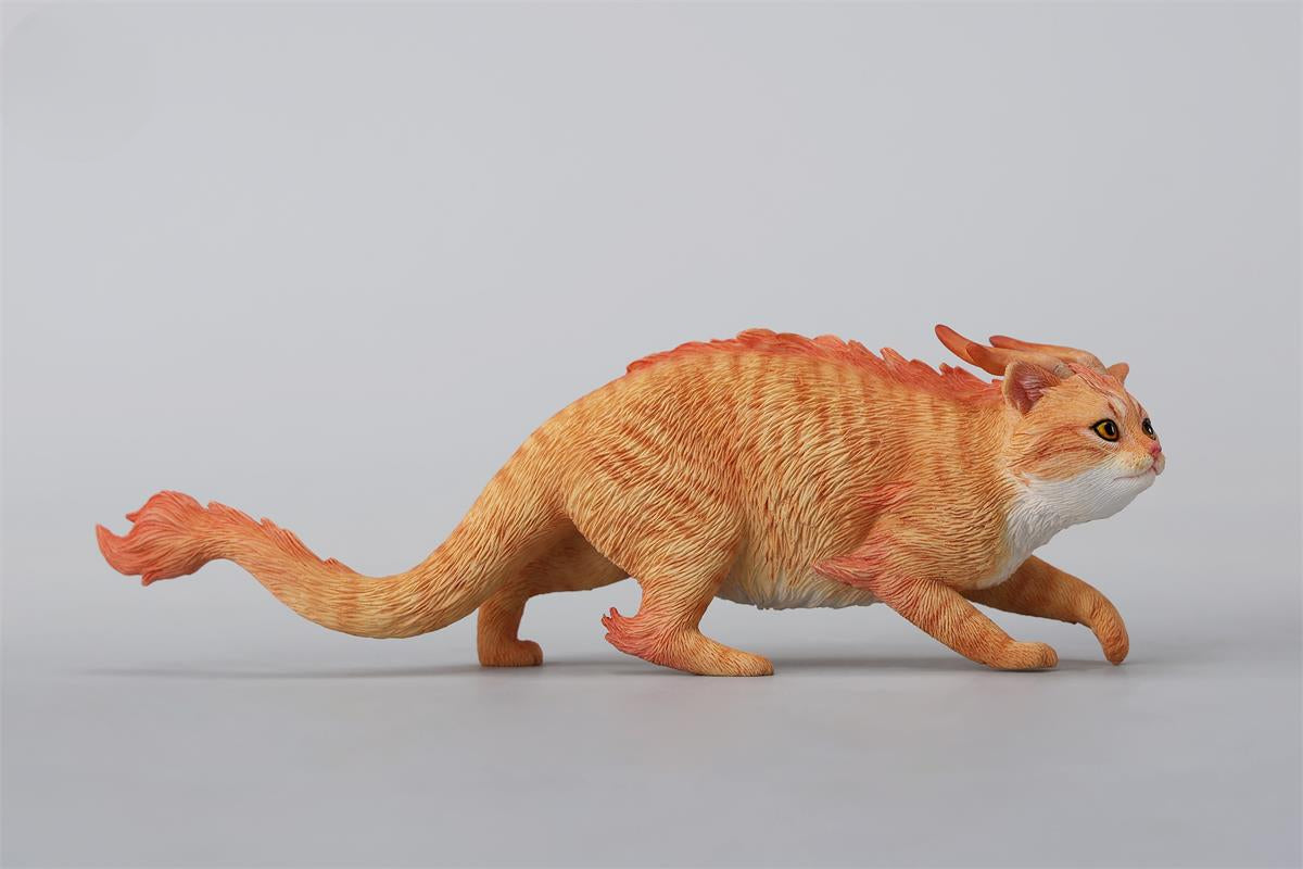 A highly detailed Catragon Figurine featuring a white feline with dragon-like features, including pastel green fur accents and delicate horns. This resin-crafted fantasy cat-dragon hybrid is an artistic and whimsical collectible. Ideal for display or as a gift for cat lovers and fantasy enthusiasts.