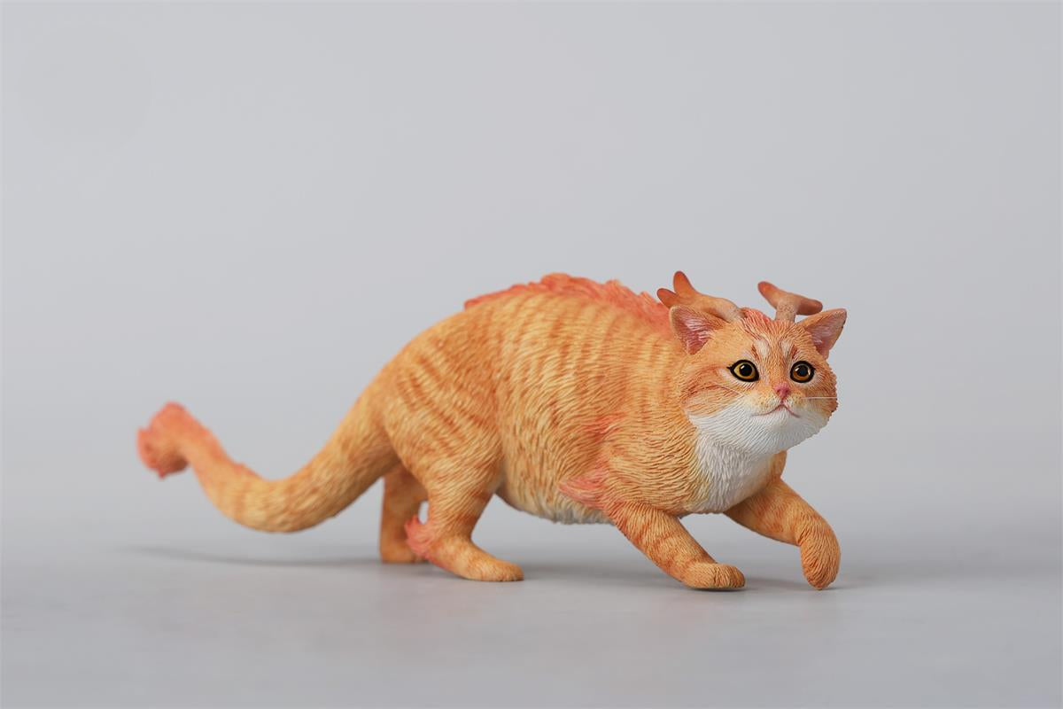 A highly detailed Catragon Figurine featuring a white feline with dragon-like features, including pastel green fur accents and delicate horns. This resin-crafted fantasy cat-dragon hybrid is an artistic and whimsical collectible. Ideal for display or as a gift for cat lovers and fantasy enthusiasts.