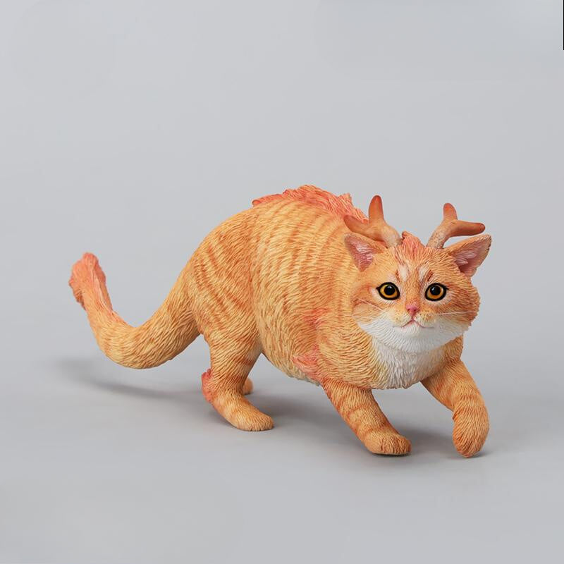 A highly detailed Catragon Figurine featuring a white feline with dragon-like features, including pastel green fur accents and delicate horns. This resin-crafted fantasy cat-dragon hybrid is an artistic and whimsical collectible. Ideal for display or as a gift for cat lovers and fantasy enthusiasts.