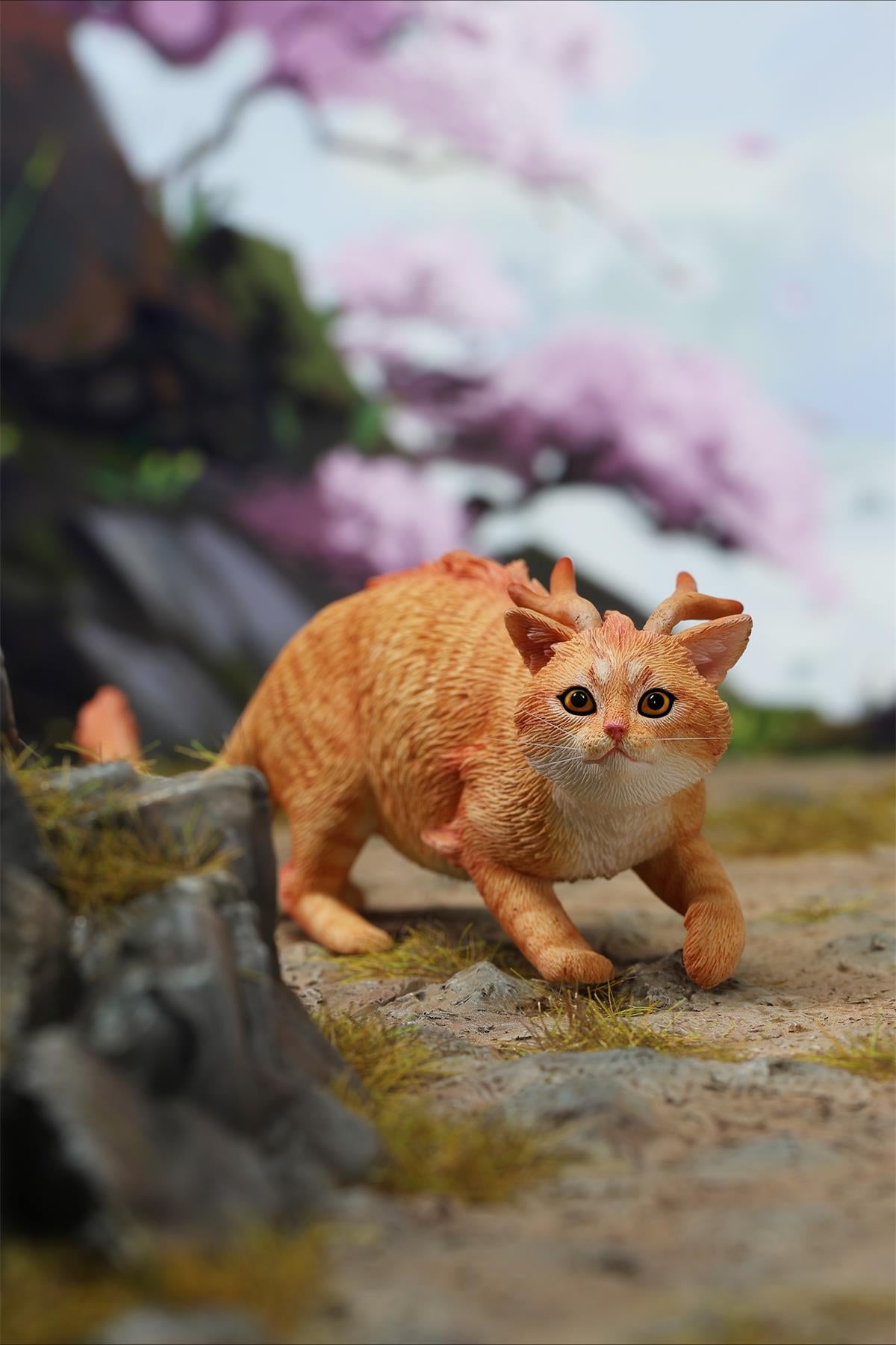 A highly detailed Catragon Figurine featuring a white feline with dragon-like features, including pastel green fur accents and delicate horns. This resin-crafted fantasy cat-dragon hybrid is an artistic and whimsical collectible. Ideal for display or as a gift for cat lovers and fantasy enthusiasts.