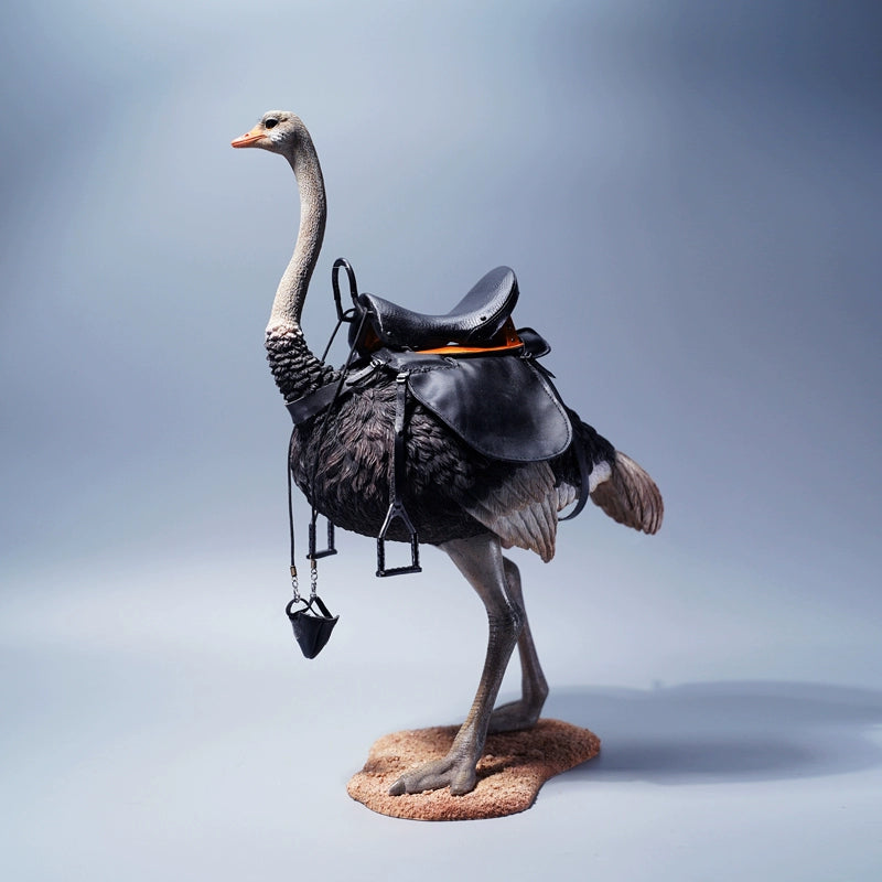 A beautifully detailed 1/6 scale ostrich model made from resin with realistic features and a platform and saddle included. Ideal for display or as a collector's item.