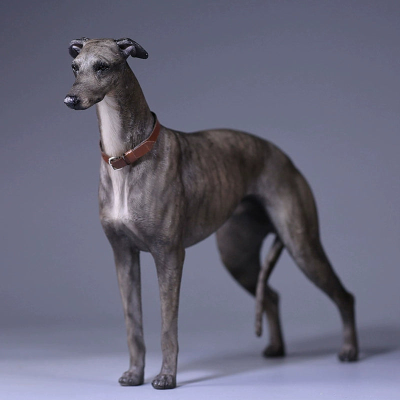 A 1/6 scale Greyhound Whippet resin model featuring lifelike details and realistic textures. The figurine showcases the breed's elegant, lean build, long legs, and alert expression. In the outdoor scene, multiple Greyhound Whippets are depicted alongside a rider on horseback, highlighting the breed's graceful and athletic nature. Ideal for collectors and dog enthusiasts.