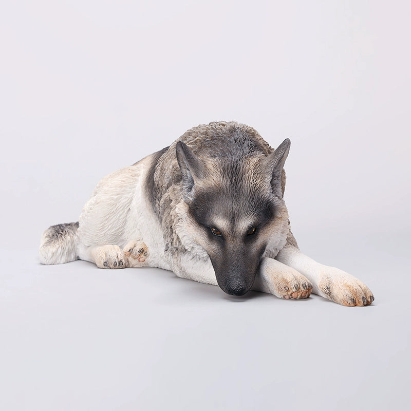 A 1/6 scale resin figurine of a lying German Shepherd dog, meticulously crafted with lifelike fur details, expressive eyes, and a realistic pose. Hand-painted to perfection, this dog statue is ideal for collectors and pet lovers, enhancing any space with its realistic appearance.