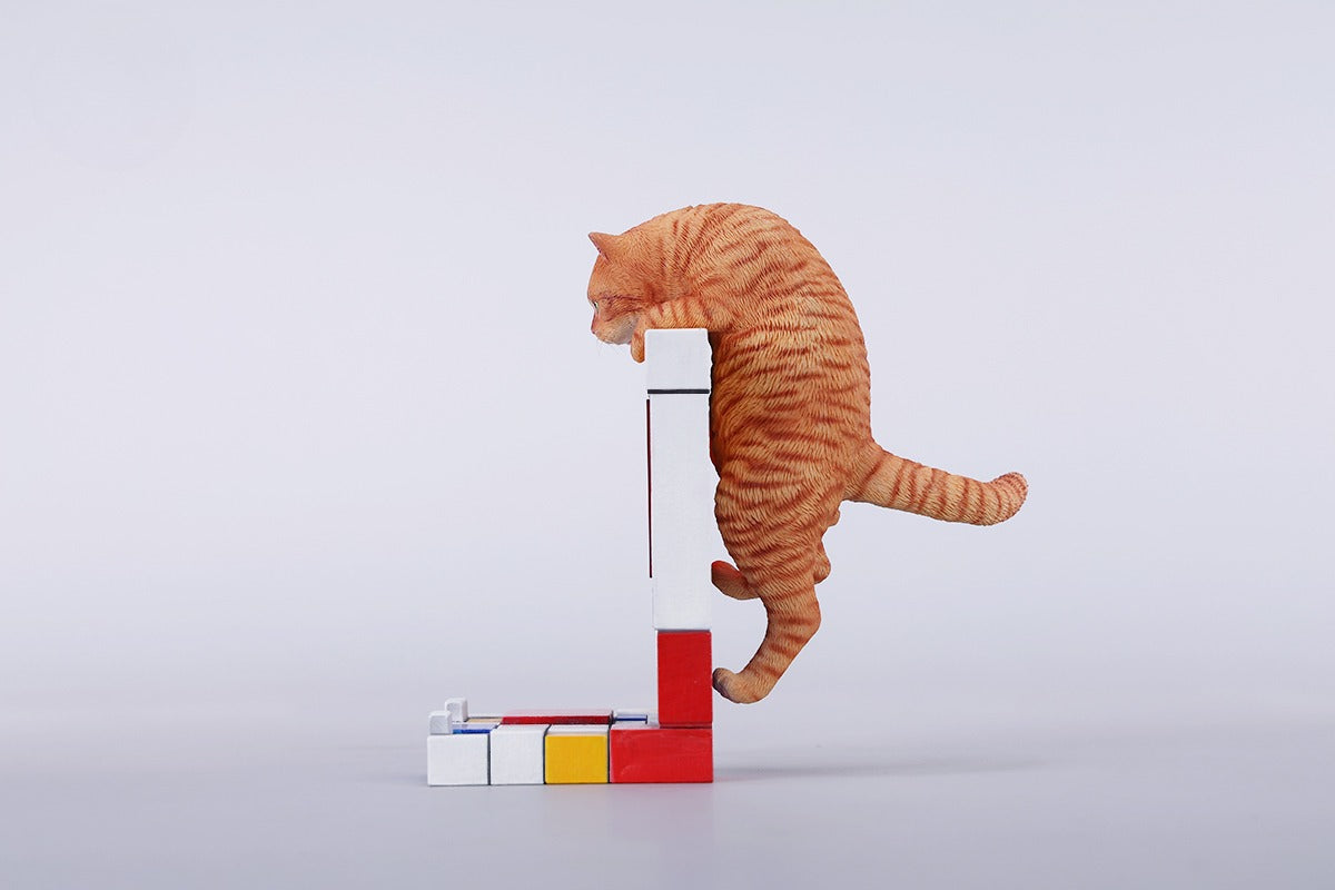 A 1/6 scale Mondrian wall-climbing cat figurine crafted from high-quality resin, featuring a playful cat climbing a colorful cubist-style wall, offering a unique and stylish addition to any home decor.