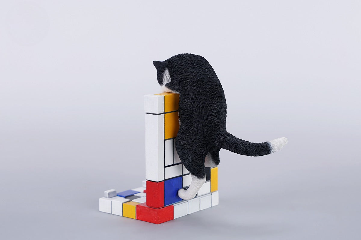 A 1/6 scale Mondrian wall-climbing cat figurine crafted from high-quality resin, featuring a playful cat climbing a colorful cubist-style wall, offering a unique and stylish addition to any home decor.